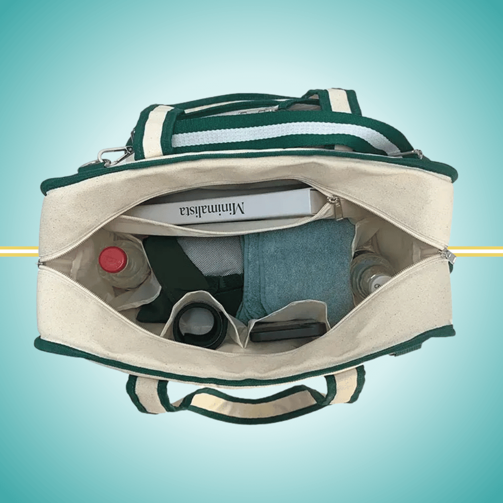 A vintage-inspired tennis tote bag for women, featuring an attached front racket case, an adjustable crossbody strap, and a crisp white design with classic green stripes.