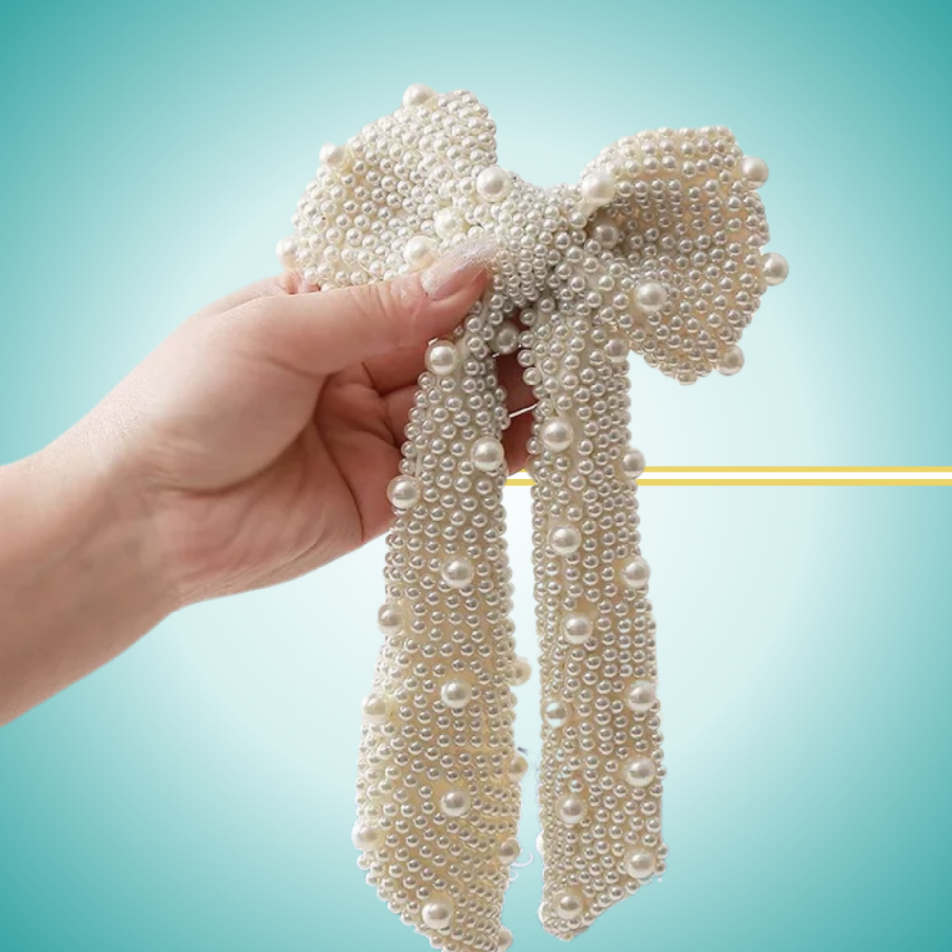 Elegant long white bow hair clip adorned with delicate pearl embellishments, perfect for special occasions or everyday wear.