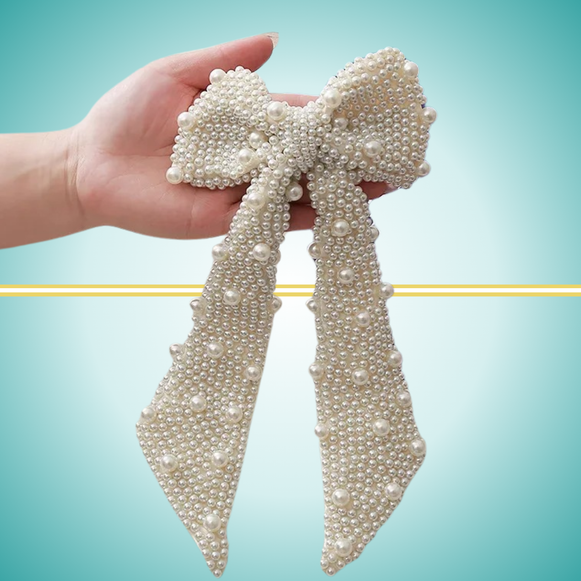 Elegant long white bow hair clip adorned with delicate pearl embellishments, perfect for special occasions or everyday wear.