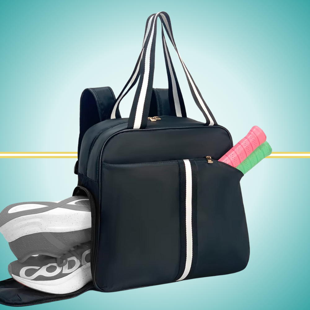 pickleball backpack featuring dedicated shoe compartment and convenient two-paddle capacity cover in front pocket black