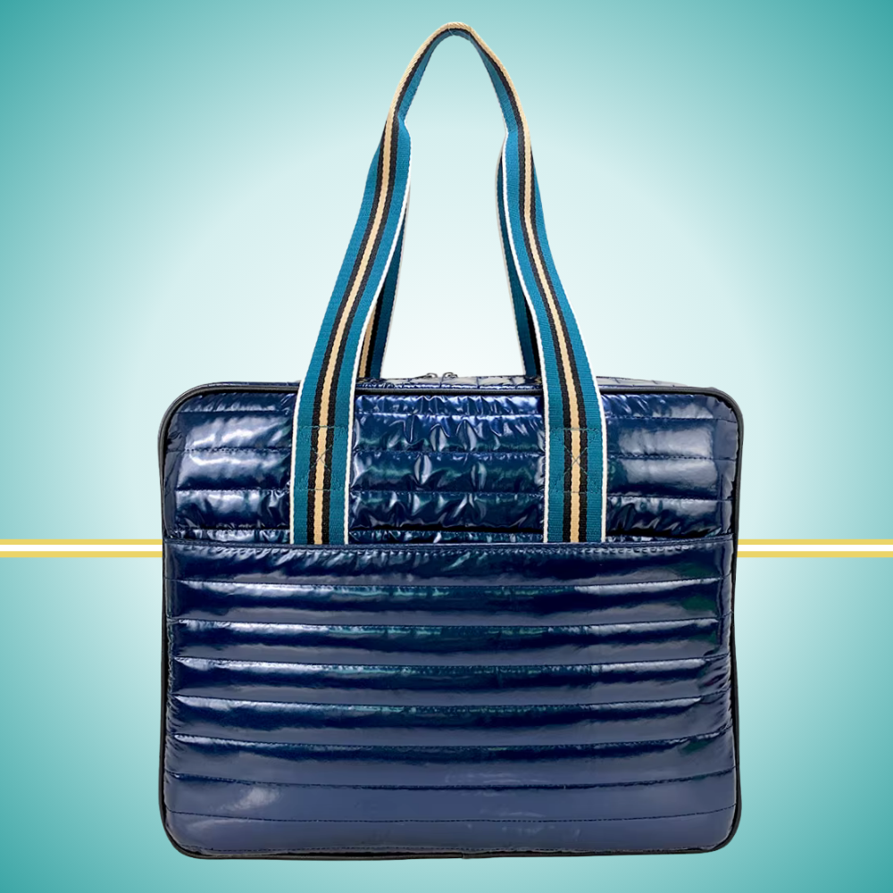 Luxury pickleball puffer tote bag with innovative 2-in-1 design - detachable paddle cover connects with adjustable strap to transform into crossbody bag while main tote holds gear navy