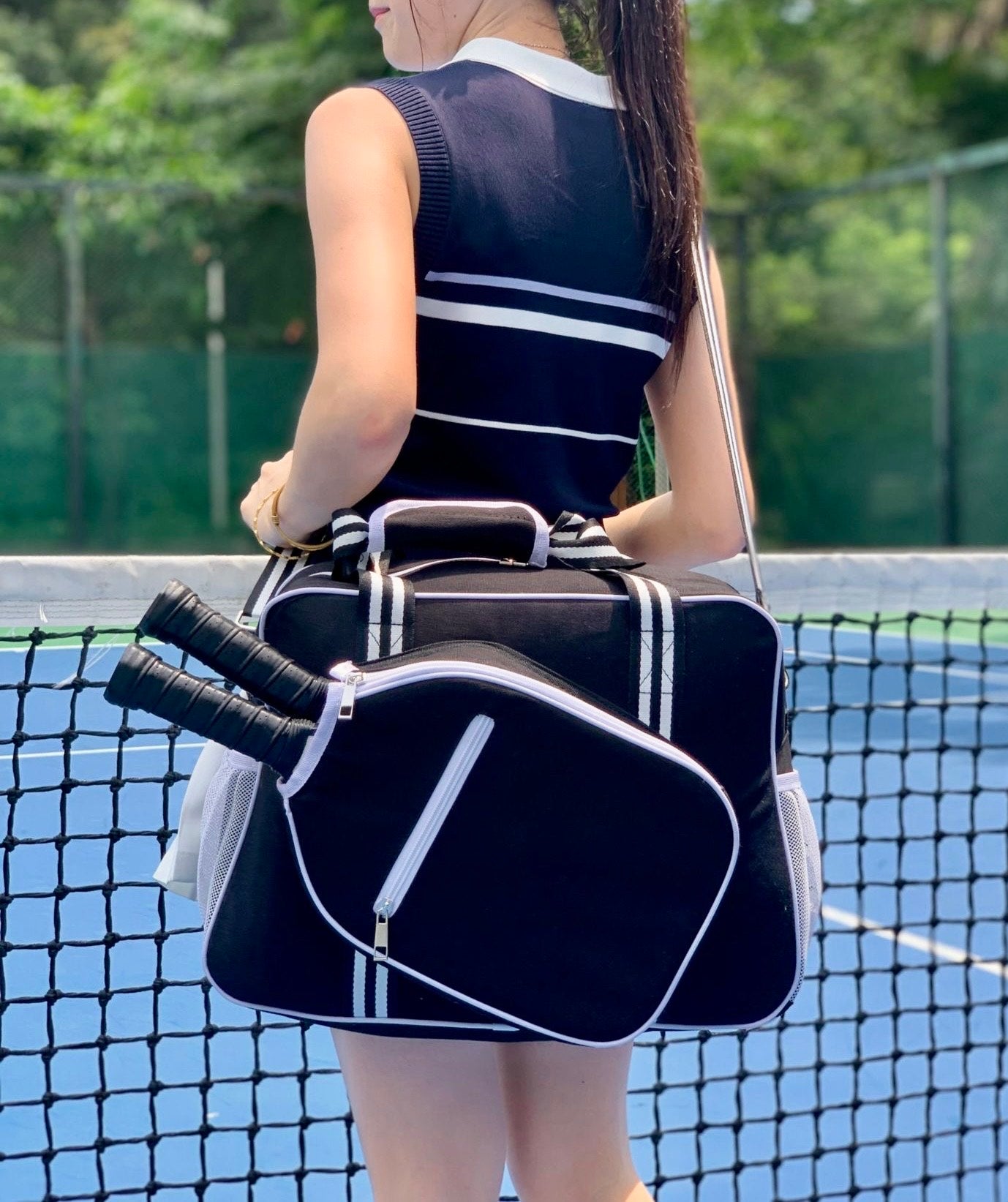 Black Pickleball Tote Bag for Women with two-paddle storage case, shown from front view