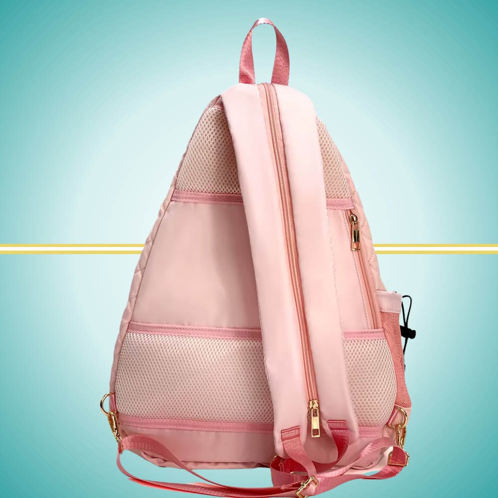 Pink puffer tennis convertible backpack for women with zipper transformation system - easily converts to sling bag while maintaining two-racket storage capacity