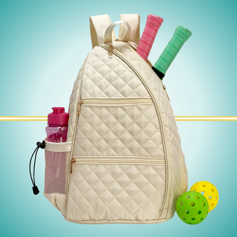 White puffer tennis convertible backpack for women with zipper transformation system - easily converts to sling bag while maintaining two-racket storage capacity