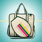 A vintage-inspired tennis tote bag for women, featuring an attached front racket case, an adjustable crossbody strap, and a crisp white design with classic stripes yellow,pink and green.

